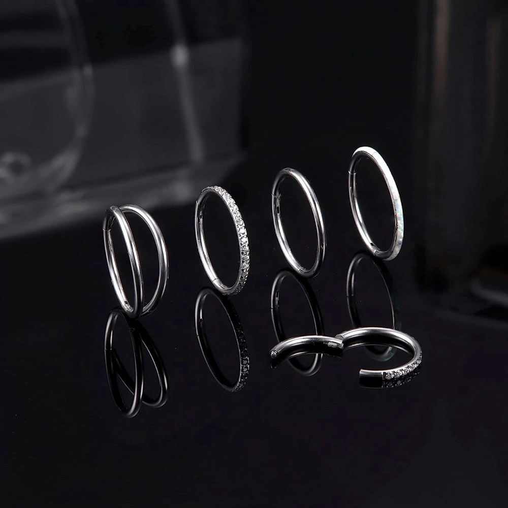 Brand new 16GG nose, belly button, or septum rings - pack of 4!